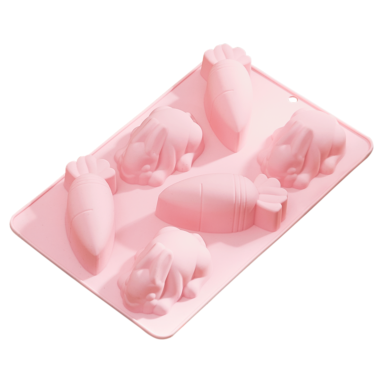 Pinke Silikonformen mit Hasen und Karotten