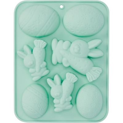 Grüne Silikonform in Form von Karotten und Hasen